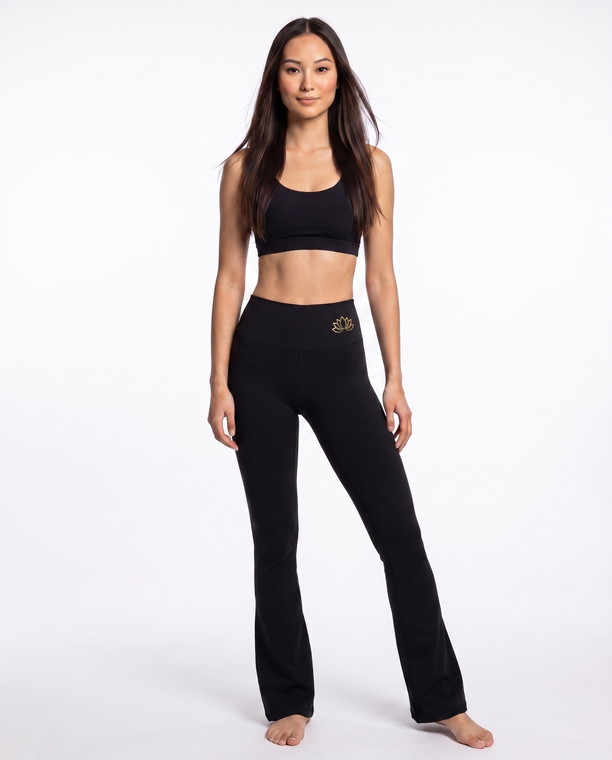 Bloom Flared Leggings in black with gold lotus emblem on the waistband